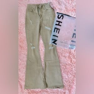 Women’s Distressed Flare Pants